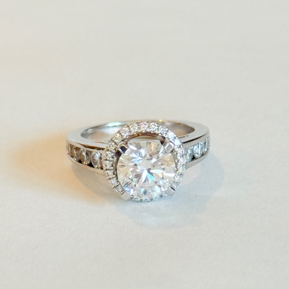 Elegant new 14k white gold substantial ring. 1.70 DVS1 certified center